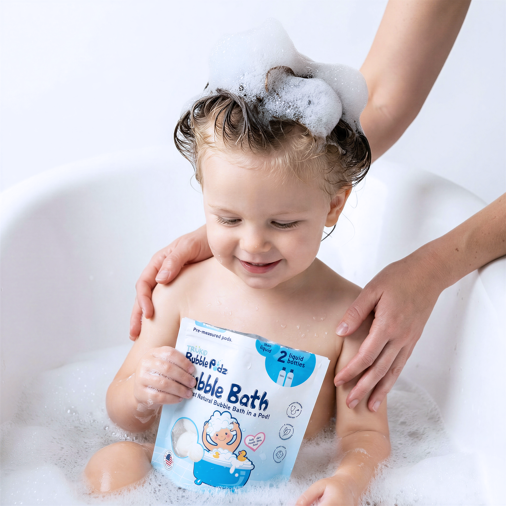 Child in a bubble bath with a Bubble Podz vanilla pouch, held by an adult.