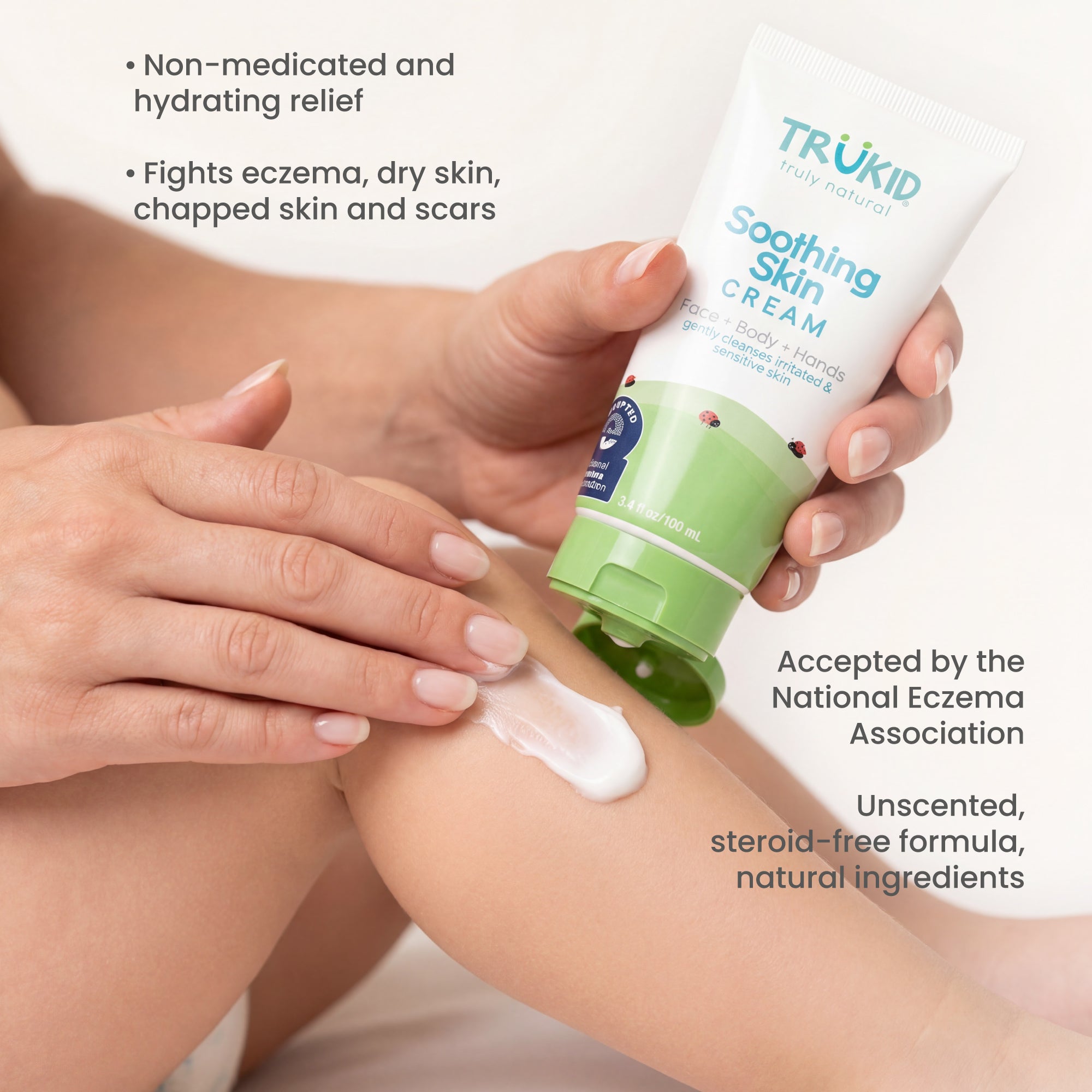 Trukid soothing skin cream being applied to a child's leg with product details.