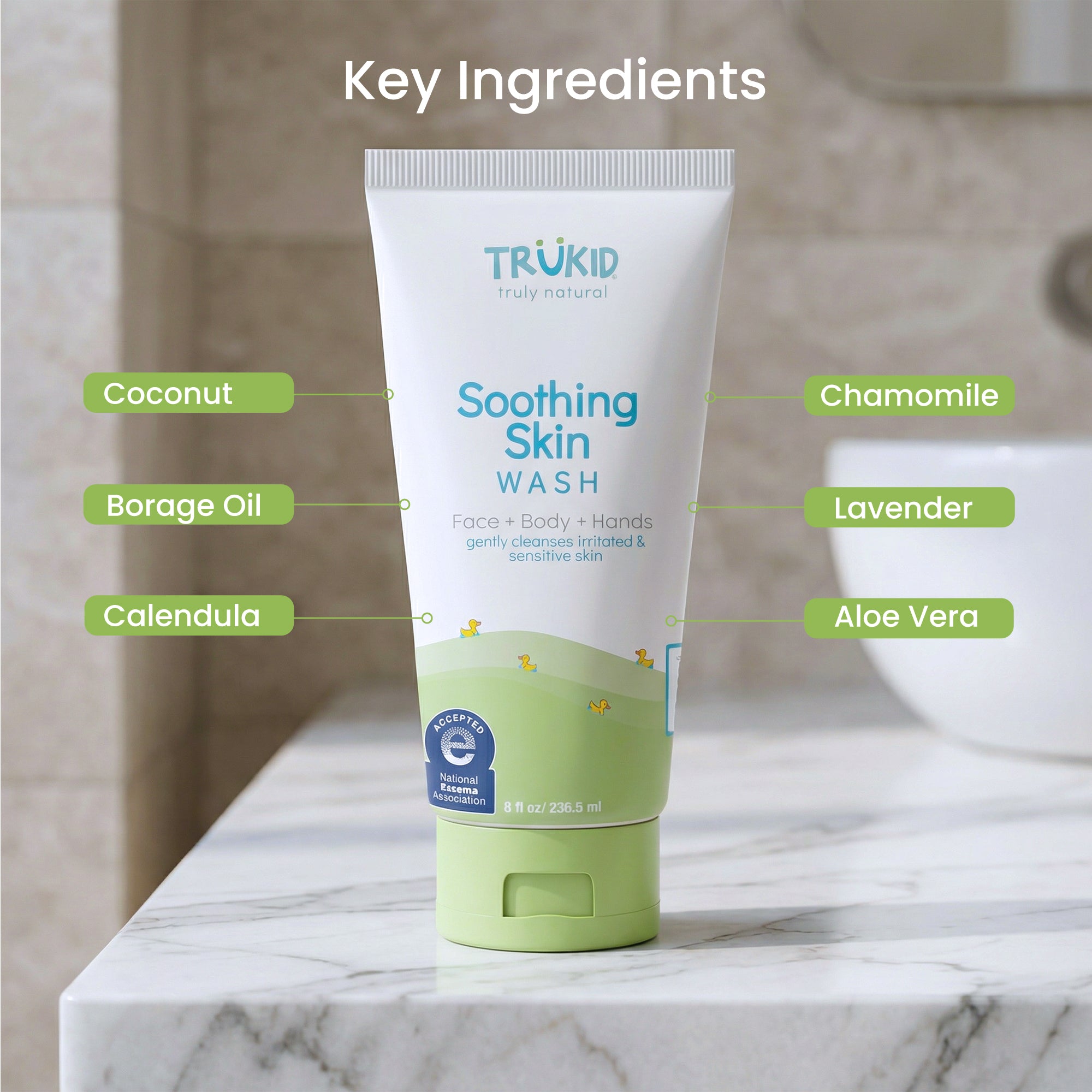Tube of Trukid Soothing Skin Wash with key ingredients listed on a marble surface.
